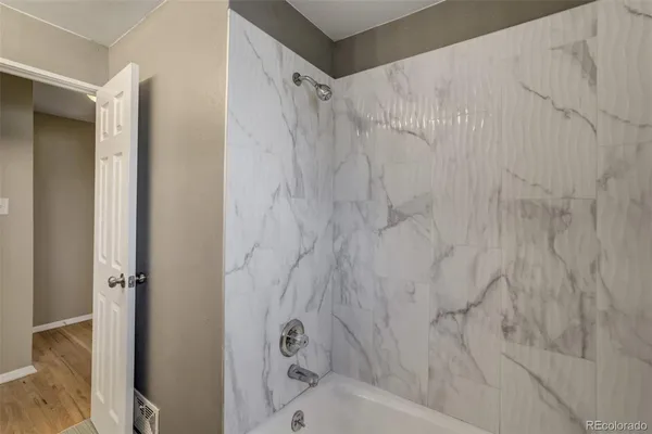 a bathroom with a shower curtain