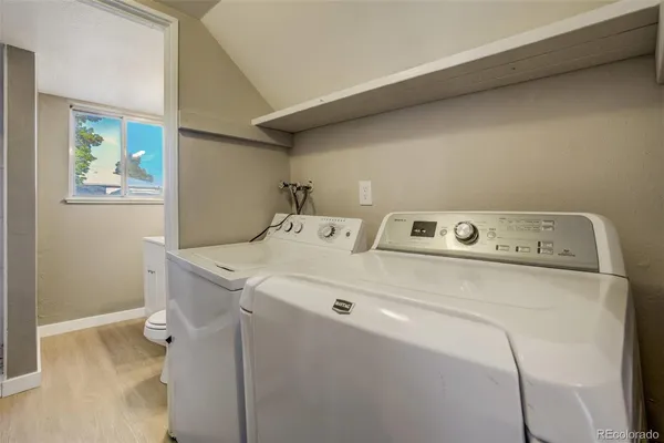 a utility room with dryer and washer