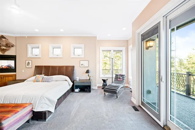 a spacious bathroom with a tub sink and mirror