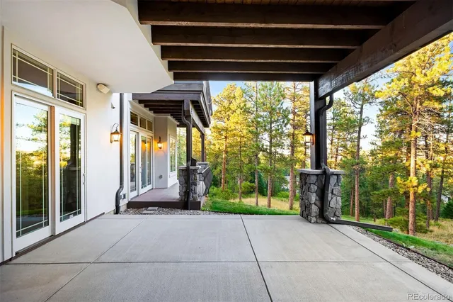 a kitchen with a dining table and chairs