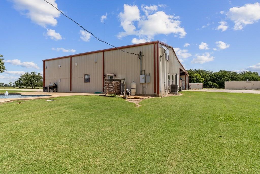 800 County Road 2807 Mabank, TX 75147 - Photo 32 of 40 a backyard of a house with table and chairs