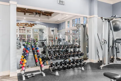 a view of gym equipment and children play room