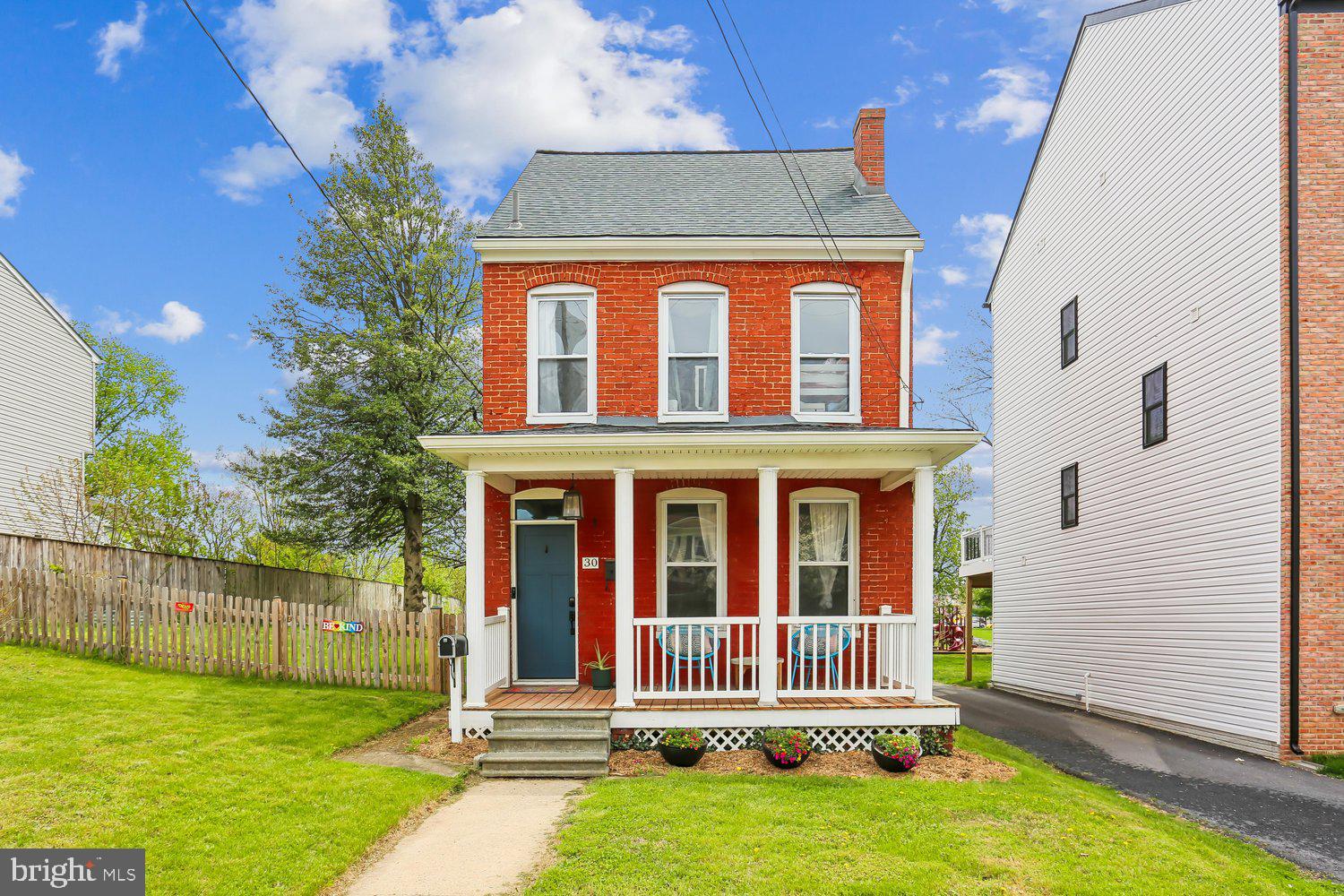 30 Hamilton Avenue Frederick, MD 21701 - Photo 1 of 38 Charming red brick home with inviting porch.