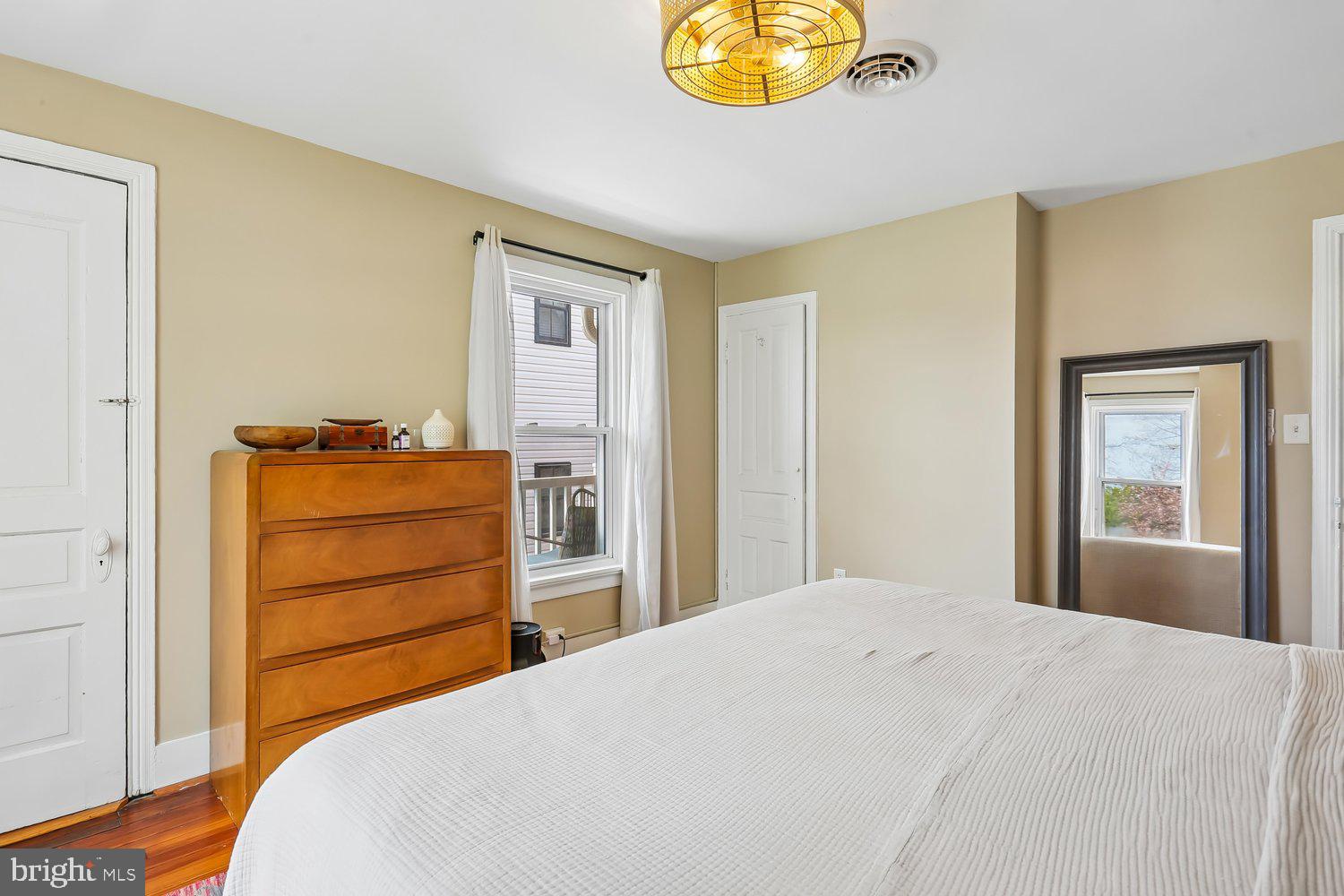 30 Hamilton Avenue Frederick, MD 21701 - Photo 18 of 38 Serene bedroom with natural light and charm.