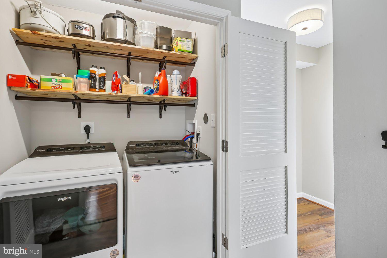 30 Hamilton Avenue Frederick, MD 21701 - Photo 30 of 38 Efficient laundry space with stylish storage.