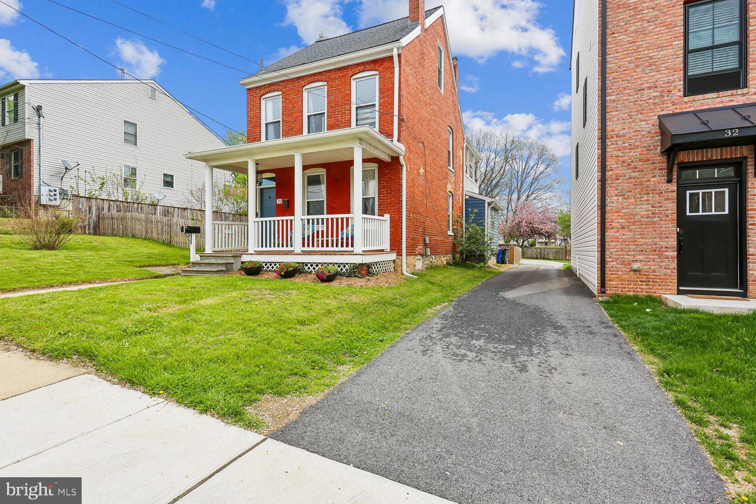 30 Hamilton Avenue Frederick, MD 21701 - Photo 3 of 38 Charming red brick home with inviting porch.