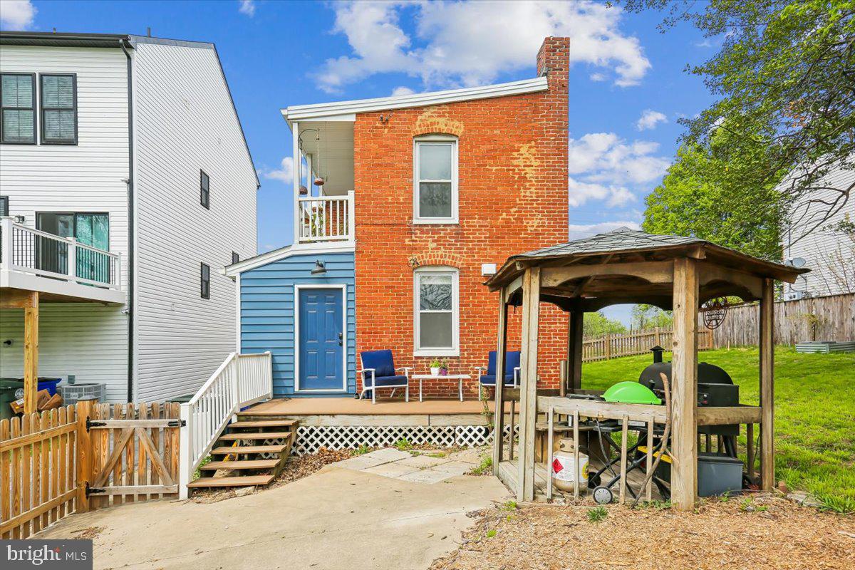 30 Hamilton Avenue Frederick, MD 21701 - Photo 33 of 37 a front view of a house with a porch