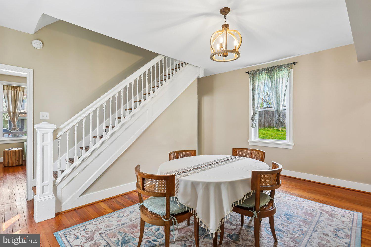 30 Hamilton Avenue Frederick, MD 21701 - Photo 9 of 37 a view of a dining room with furniture and a chandelier