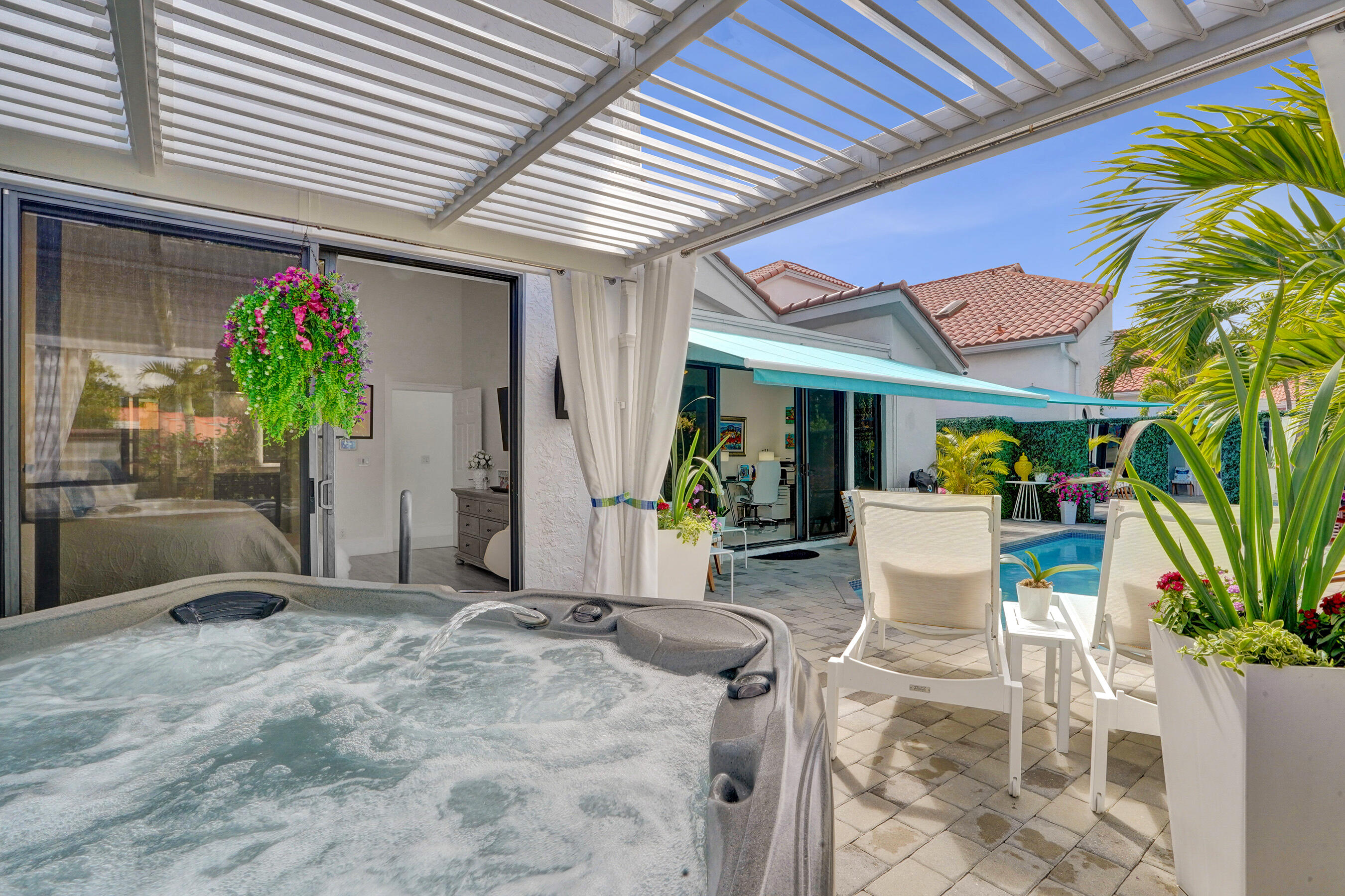 5851 Northwest 21st Avenue Boca Raton, FL 33496 - Photo 28 of 61 Hot Tub under Pergola