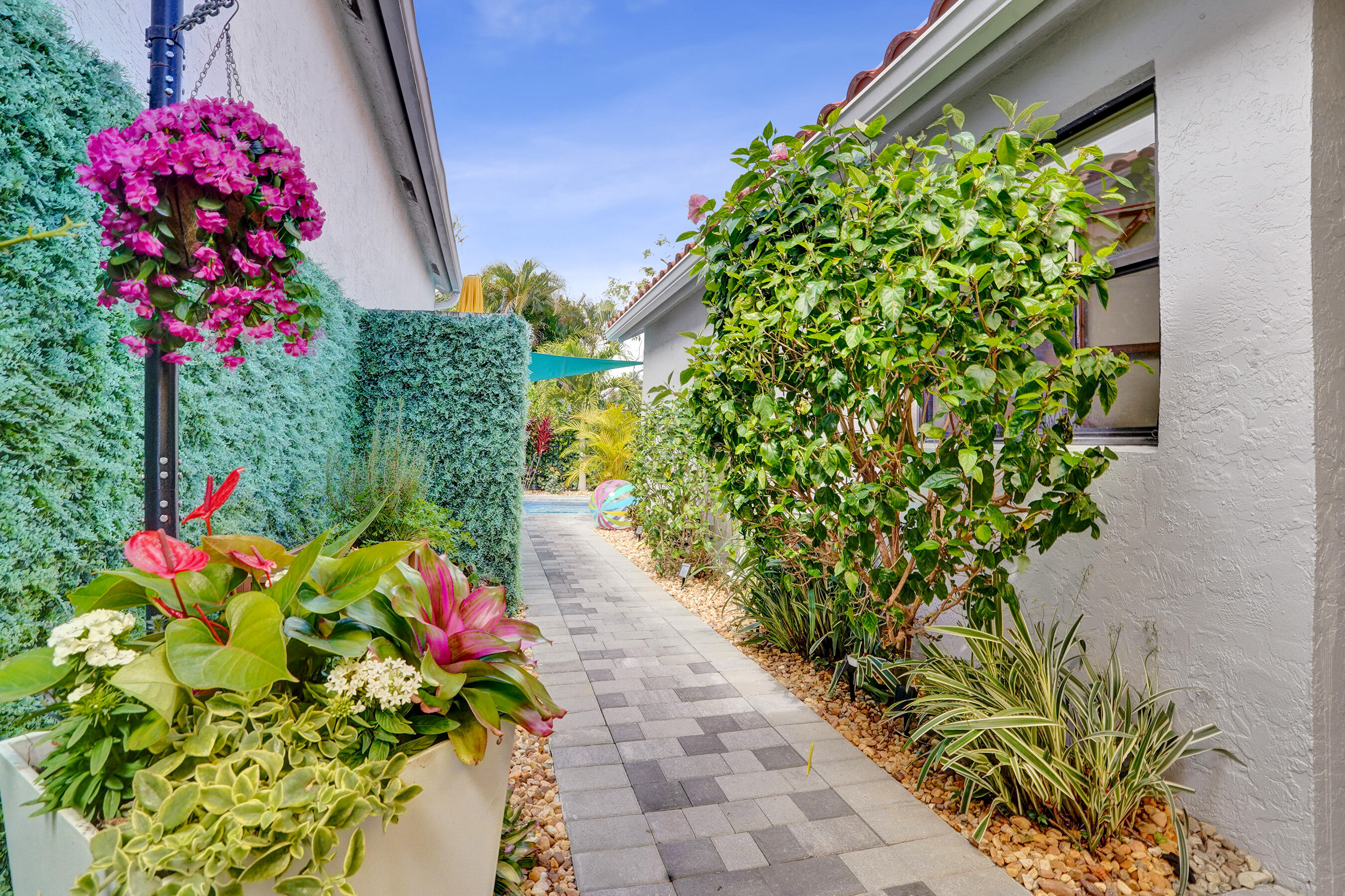 5851 Northwest 21st Avenue Boca Raton, FL 33496 - Photo 30 of 61 Walkway between Pool and Outdoor Dining