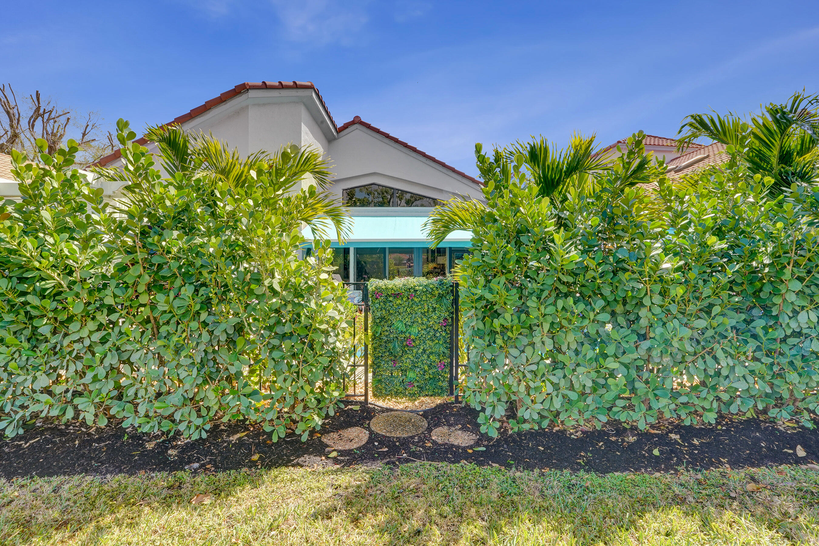 5851 Northwest 21st Avenue Boca Raton, FL 33496 - Photo 32 of 61 Gate behind house to open yard