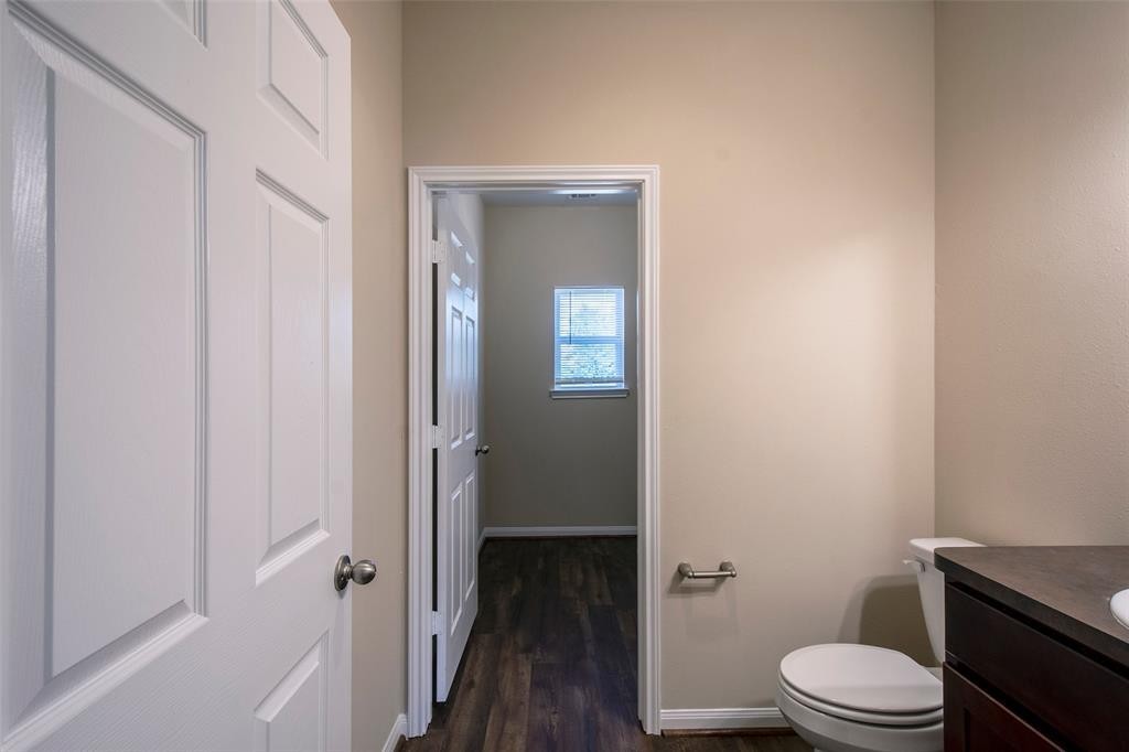 8142 Cabot Street, Unit A Houston, TX 77078 - Photo 7 of 21 a bathroom with a toilet