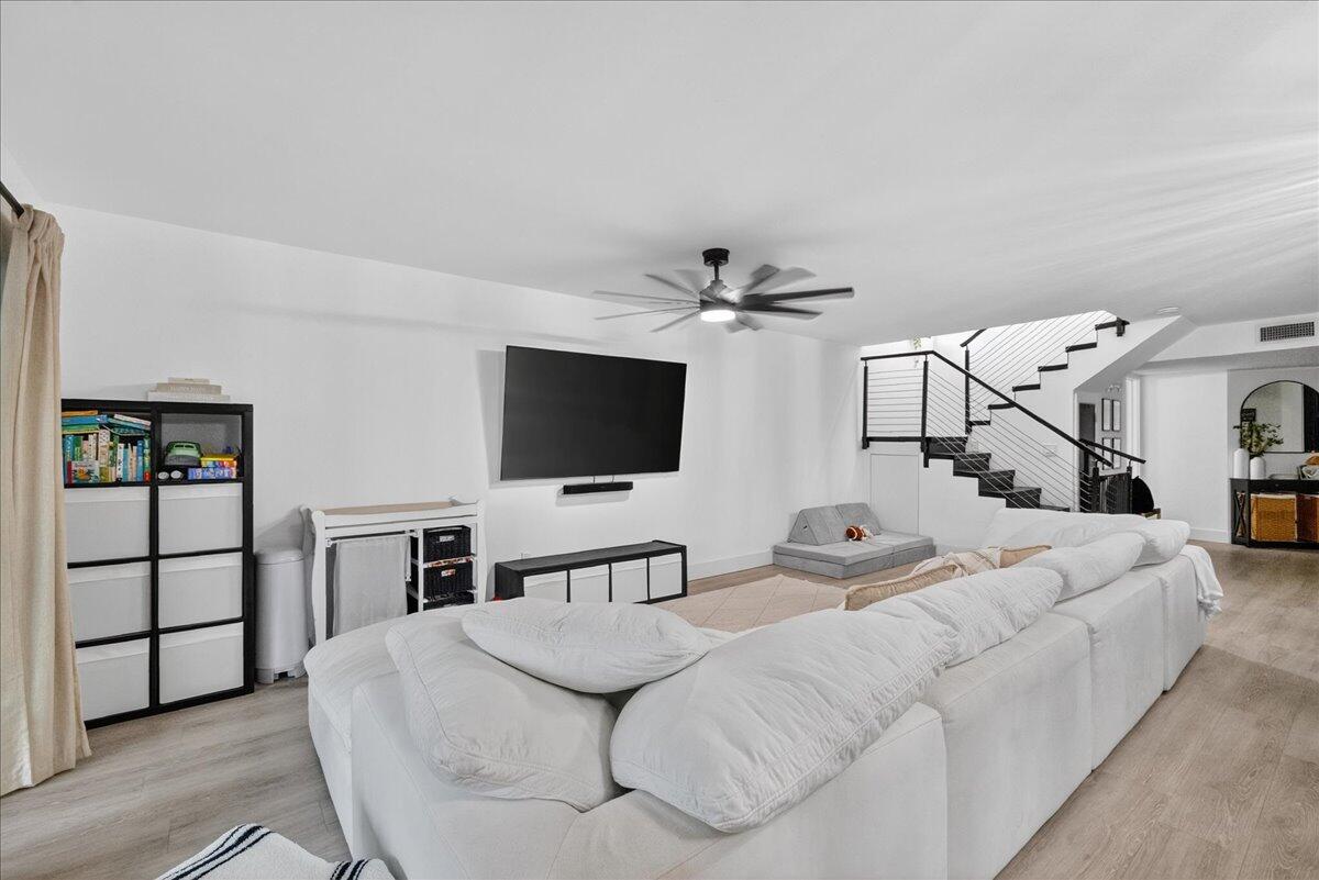 9729 North New River Canal Road, Unit 628 Plantation, FL 33324 - Photo 16 of 50 a living room with furniture and a flat screen tv