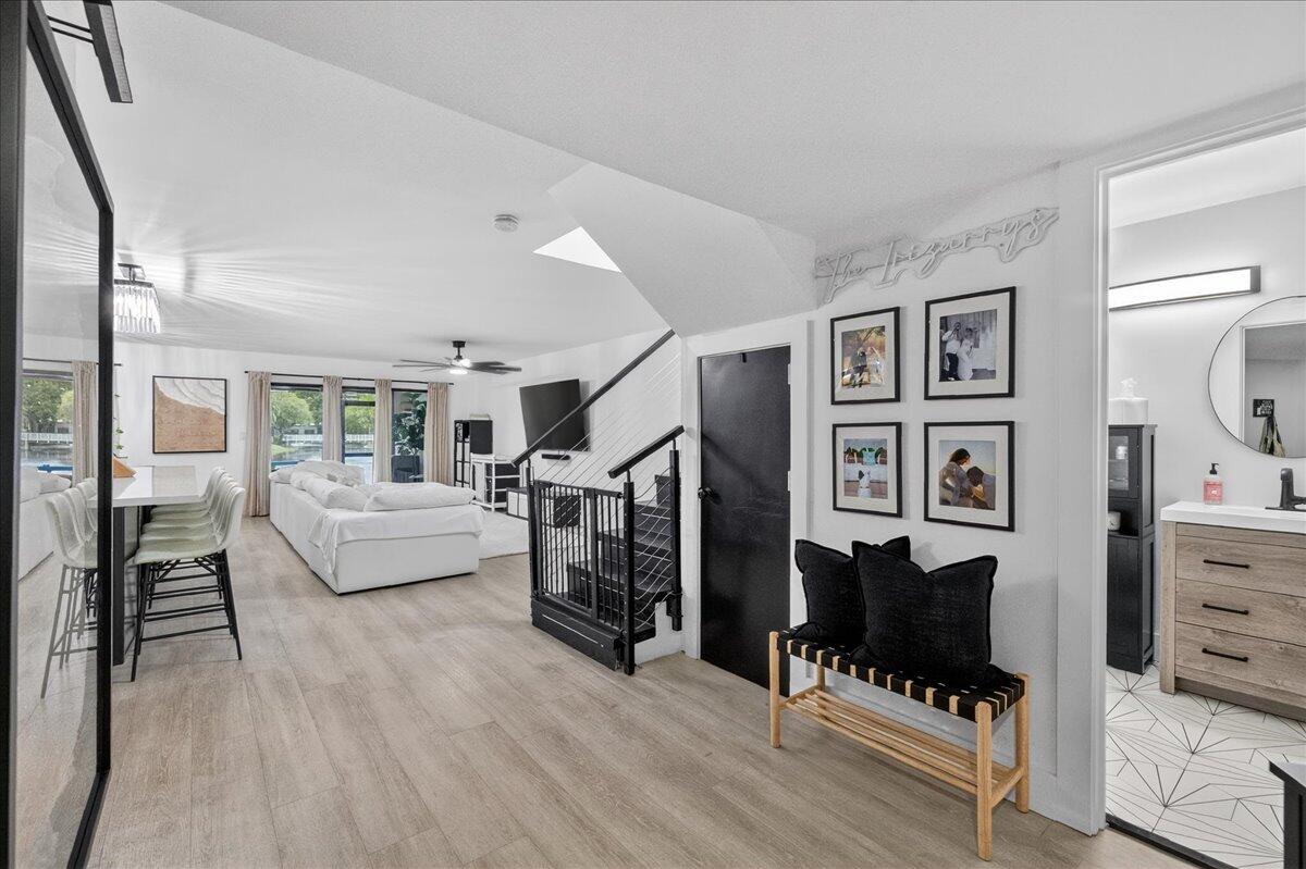 9729 North New River Canal Road, Unit 628 Plantation, FL 33324 - Photo 3 of 50 a living room with furniture and wooden floor