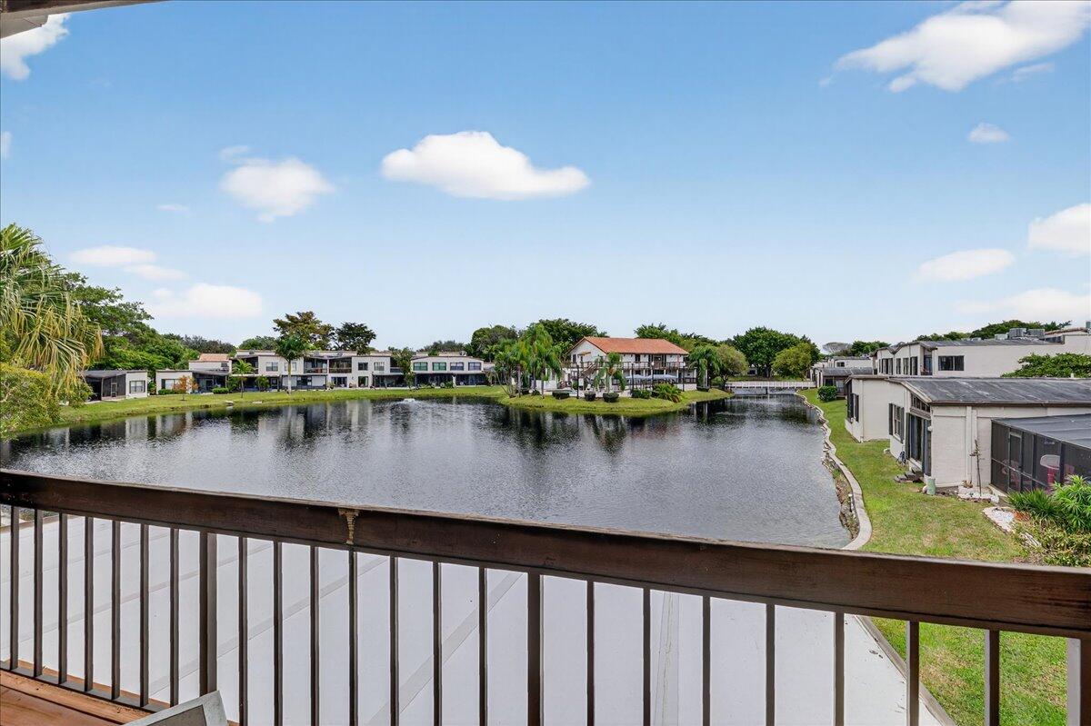 9729 North New River Canal Road, Unit 628 Plantation, FL 33324 - Photo 33 of 50 a view of swimming pool with a lake from a balcony
