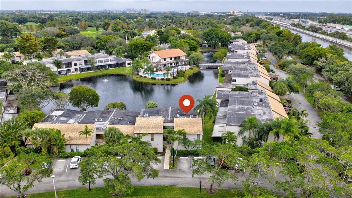 9729 North New River Canal Road, Unit 628 Plantation, FL 33324 - Photo 41 of 50 an aerial view of a house with a lake view