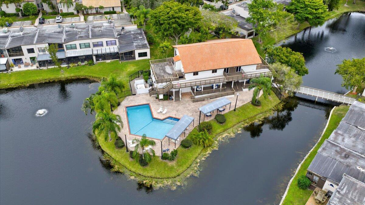 9729 North New River Canal Road, Unit 628 Plantation, FL 33324 - Photo 44 of 50 an aerial view of a house with outdoor space pool seating area and yard