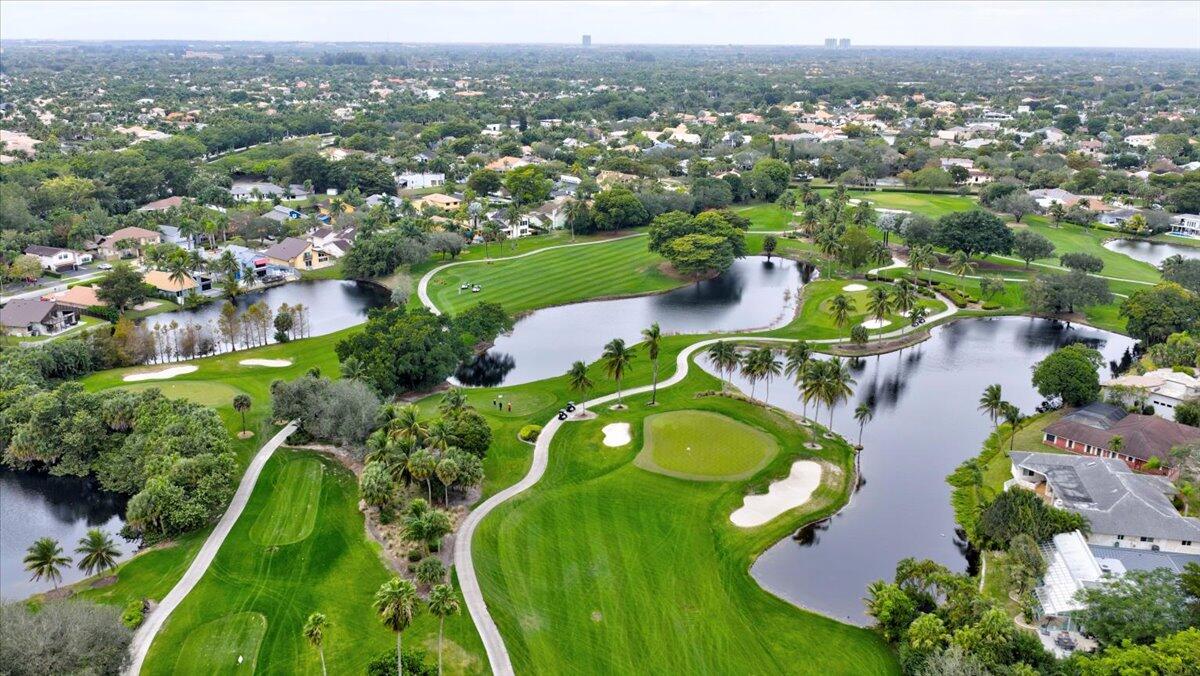 9729 North New River Canal Road, Unit 628 Plantation, FL 33324 - Photo 47 of 50 an aerial view of a house with a garden