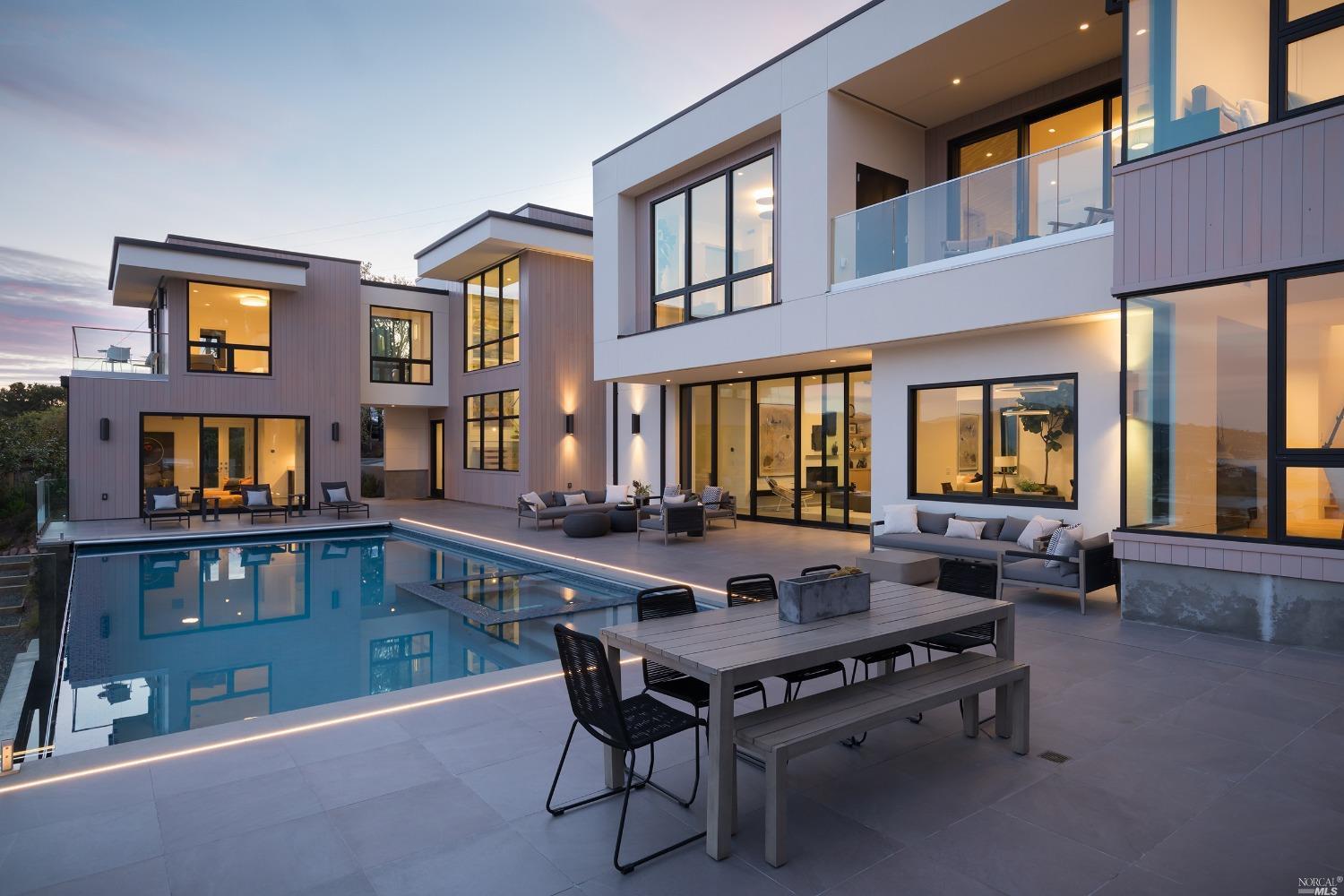 a table and chairs in front of building