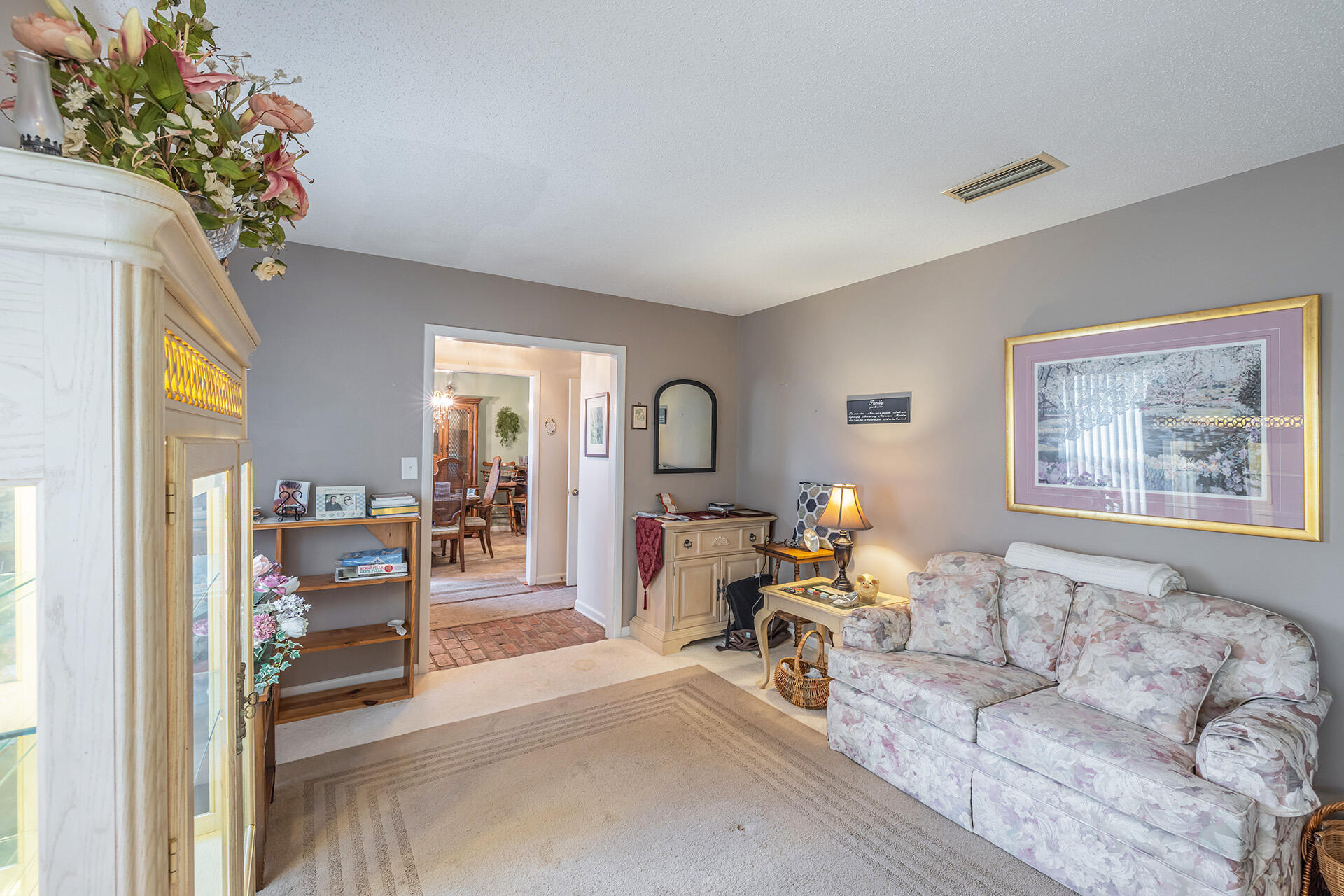 81 Country Club Road Shalimar, FL 32579 - Photo 16 of 31 a living room with furniture and a large window