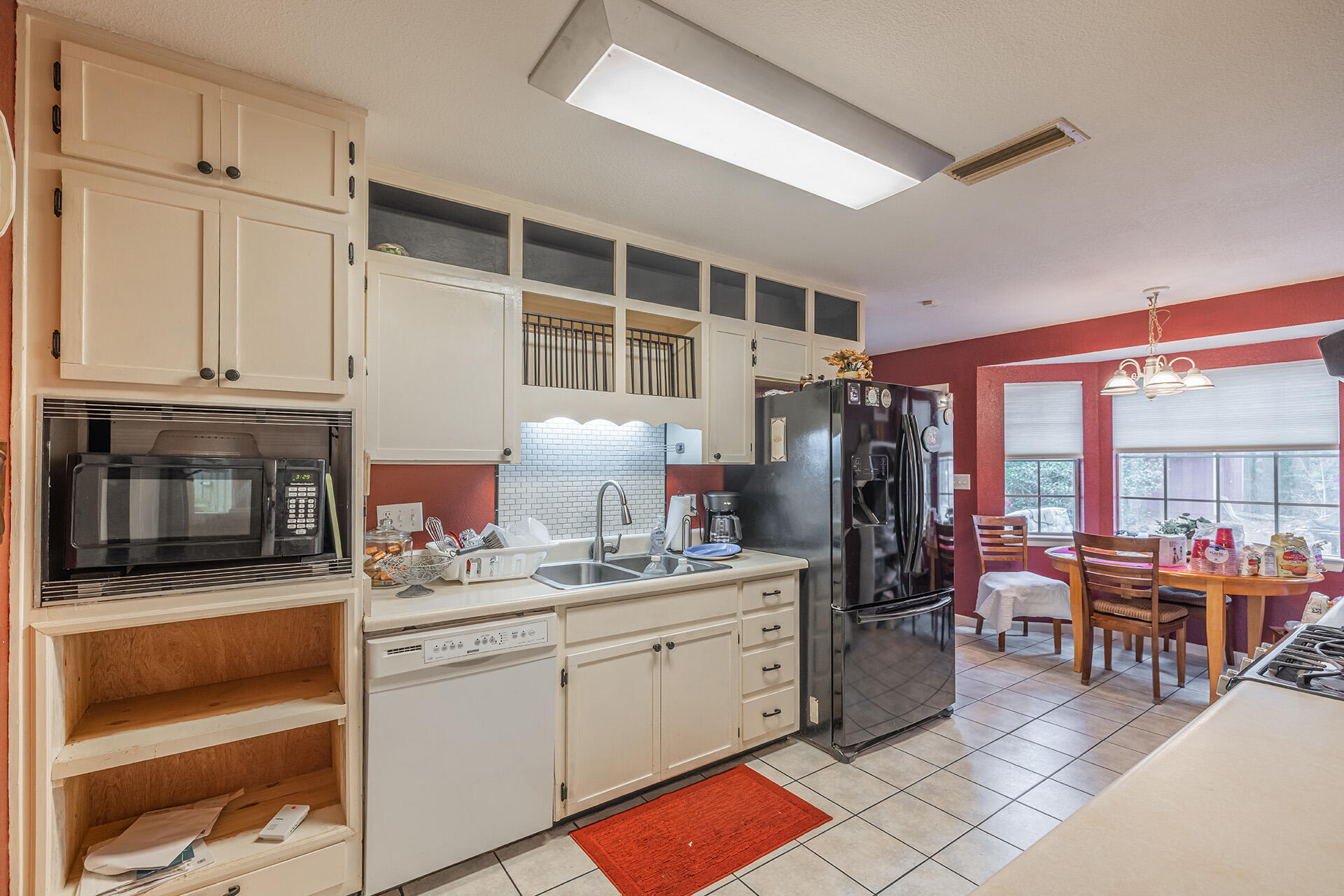 81 Country Club Road Shalimar, FL 32579 - Photo 20 of 31 a kitchen with a sink cabinets and appliances