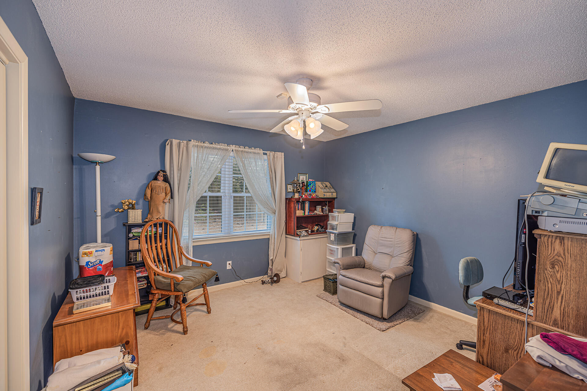 81 Country Club Road Shalimar, FL 32579 - Photo 26 of 31 a bedroom with furniture and a window