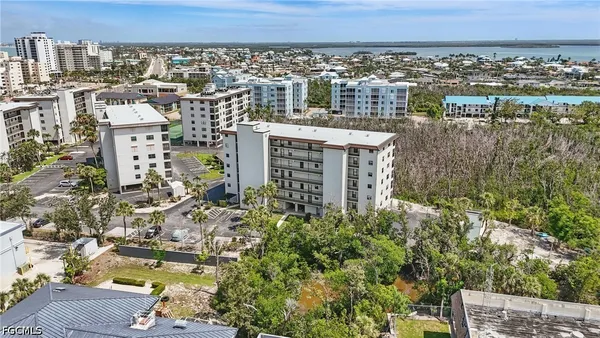 a view of city with ocean