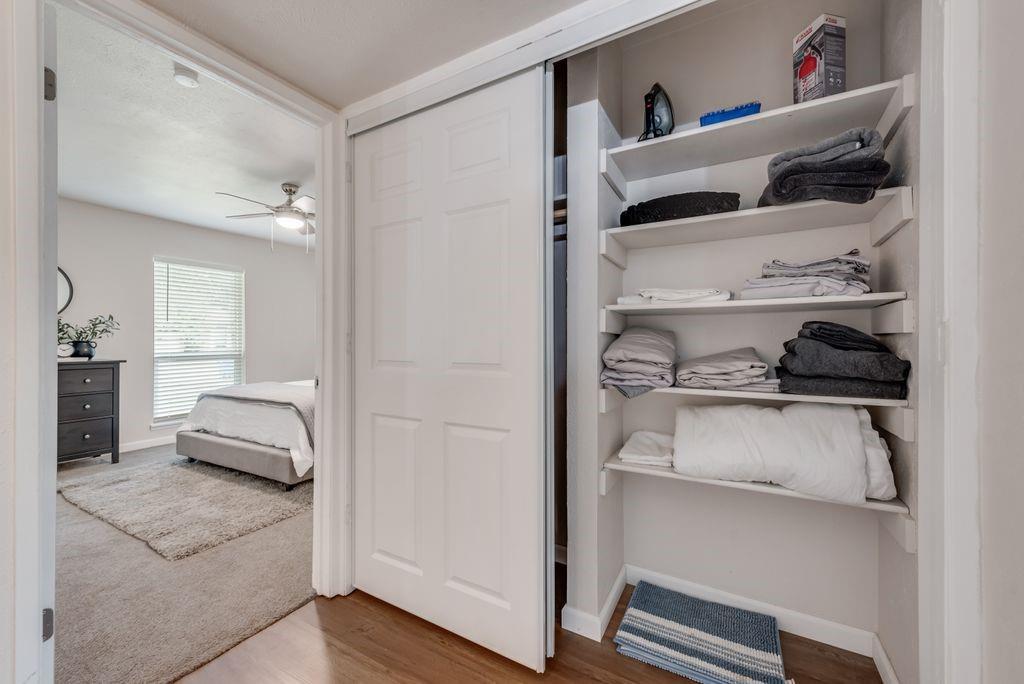 5317 Rutledge Court The Colony, TX 75056 - Photo 28 of 33 a kitchen with white cabinets and appliances