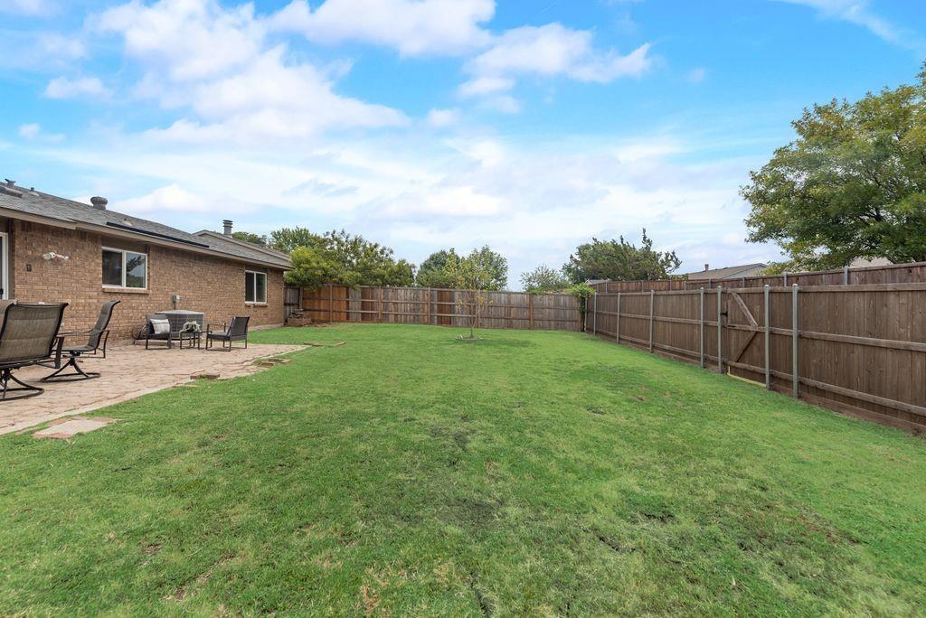 5317 Rutledge Court The Colony, TX 75056 - Photo 33 of 33 a view of a backyard with sitting area