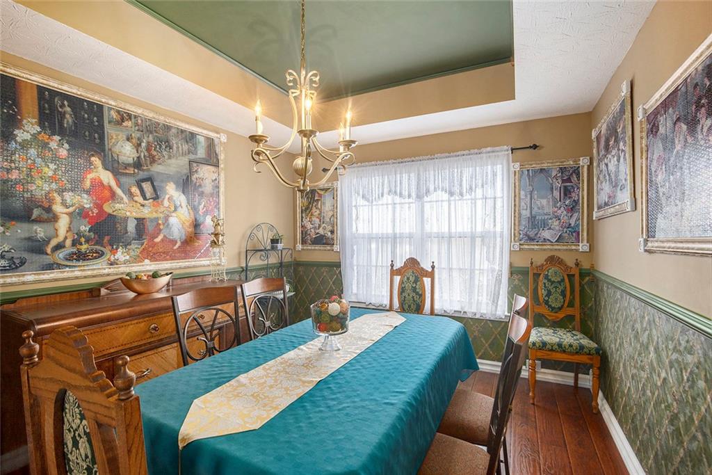 2054 Dartmoth Way Villa Rica, GA 30180 - Photo 12 of 45 a bed room with a bed and a chandelier