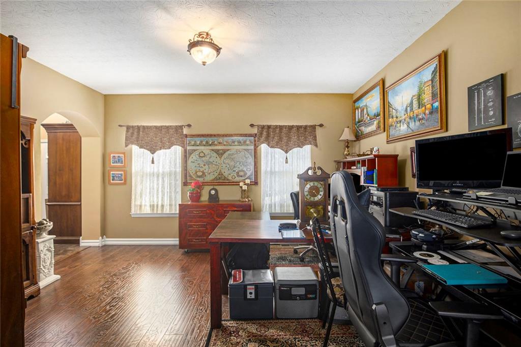 2054 Dartmoth Way Villa Rica, GA 30180 - Photo 14 of 45 a view of a livingroom with furniture and a flat screen tv