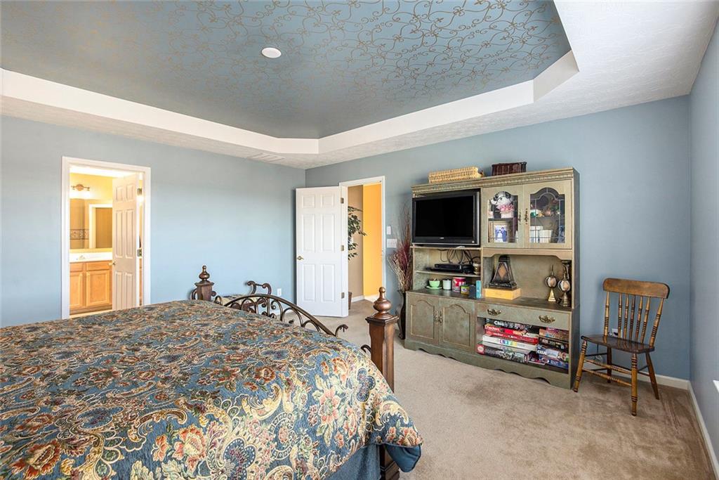 2054 Dartmoth Way Villa Rica, GA 30180 - Photo 20 of 45 a bedroom with furniture and a flat screen tv