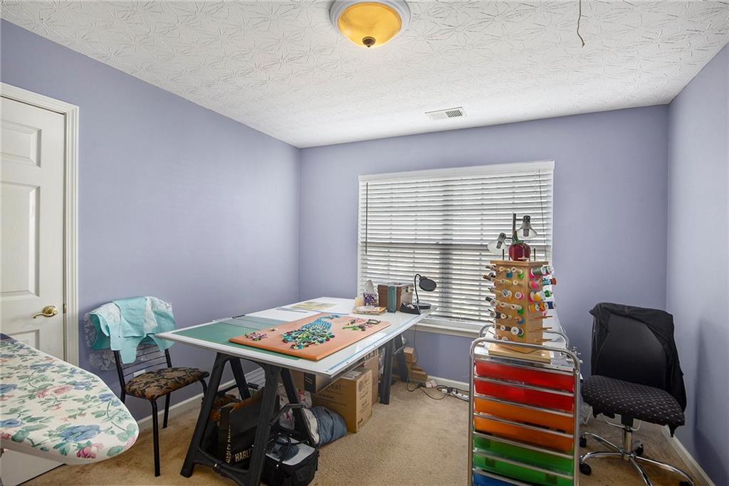 2054 Dartmoth Way Villa Rica, GA 30180 - Photo 24 of 45 a workspace with furniture and window