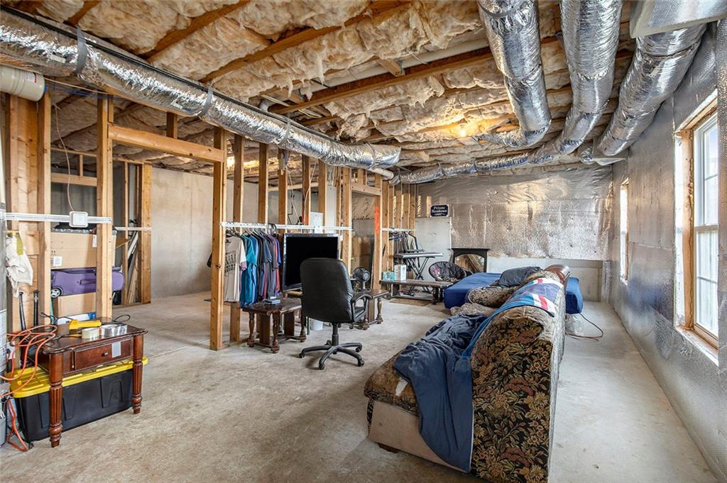 2054 Dartmoth Way Villa Rica, GA 30180 - Photo 31 of 45 a living room with furniture and a flat screen tv