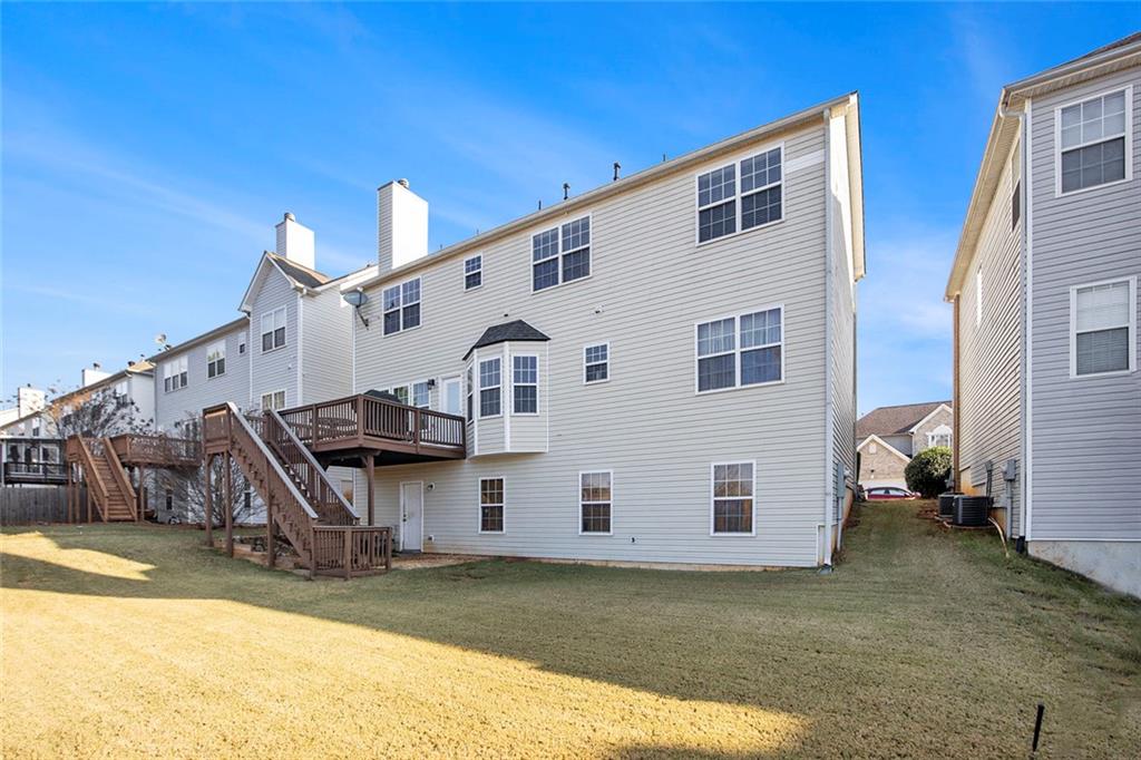 2054 Dartmoth Way Villa Rica, GA 30180 - Photo 34 of 45 a view of a house with backyard