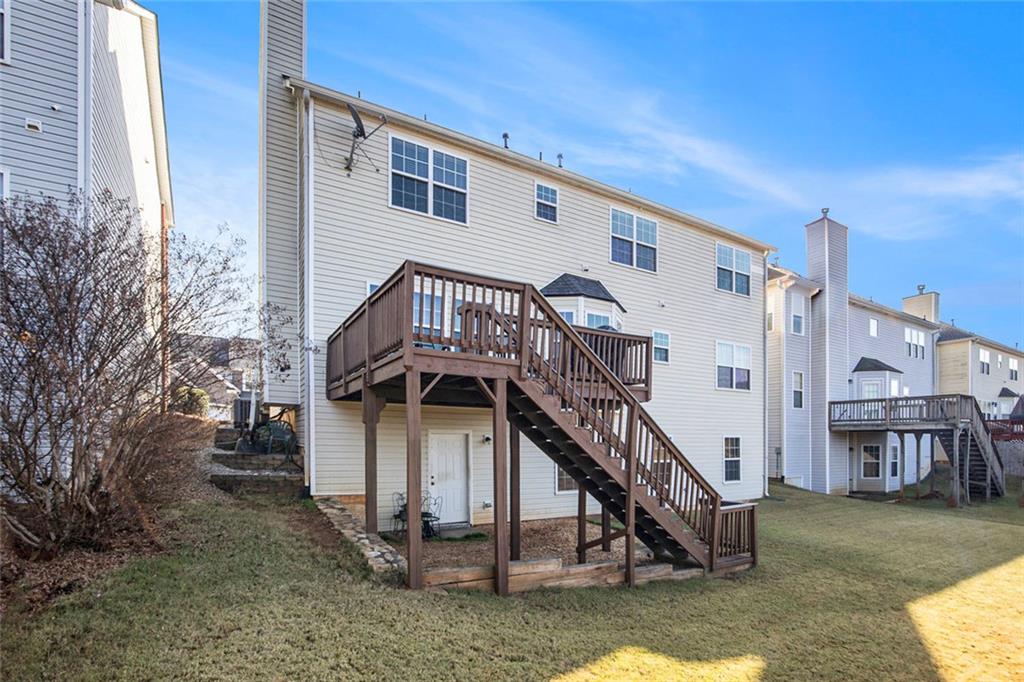 2054 Dartmoth Way Villa Rica, GA 30180 - Photo 35 of 45 a view of a house with a yard