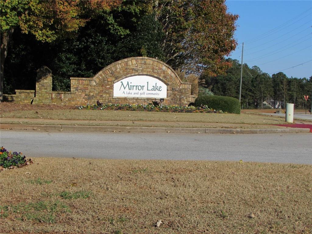 2054 Dartmoth Way Villa Rica, GA 30180 - Photo 38 of 45 a view of a house with a yard and garage