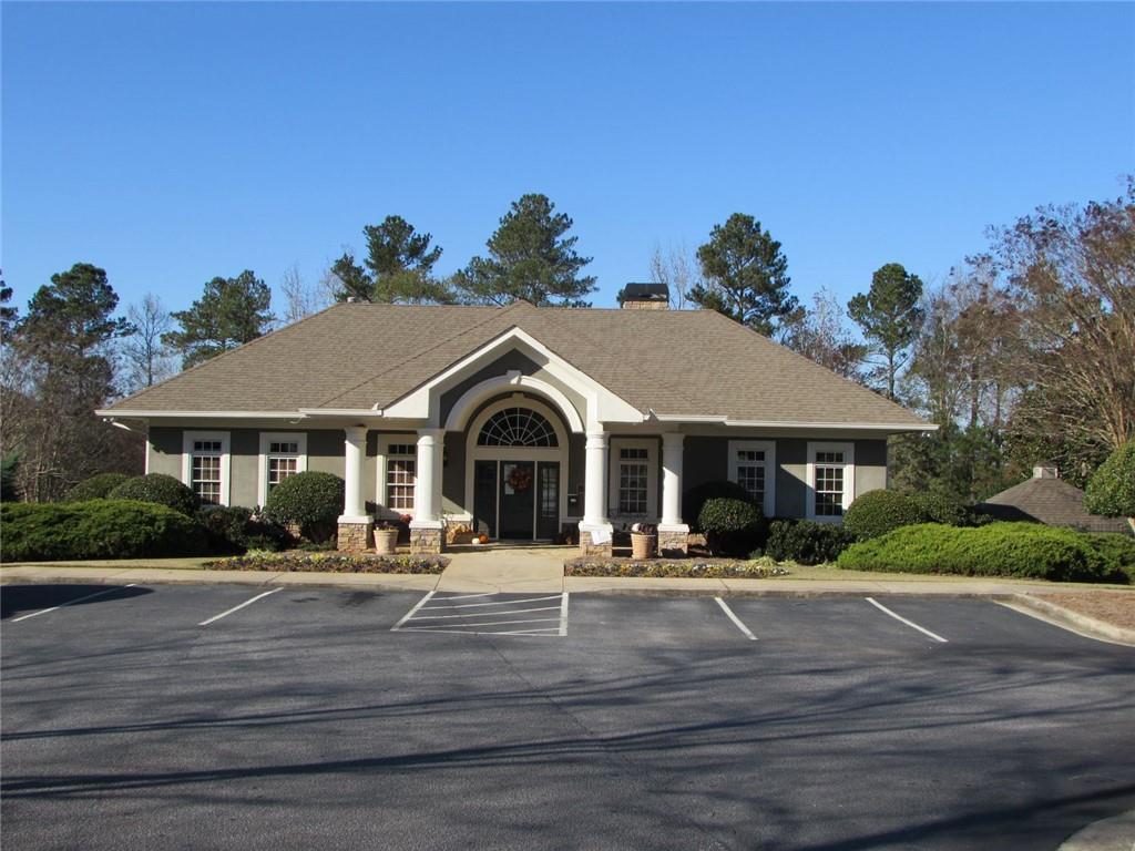 2054 Dartmoth Way Villa Rica, GA 30180 - Photo 40 of 45 a front view of a building with lots of trees