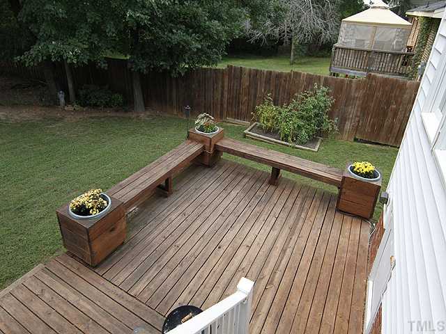 131 Forbes Road Wake Forest, NC 27587 - Photo 15 of 20 Large deck with built in seating and planters. This is a great space for grilling or just hanging out with friends and family.