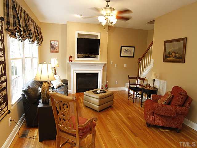 Beautiful hardwoods throughout the first floor.  Fresh, neutral paint throughout as well.  Living room is large enough to accommodate a crowd.  Gas logs are great for chilly fall and winter nights.