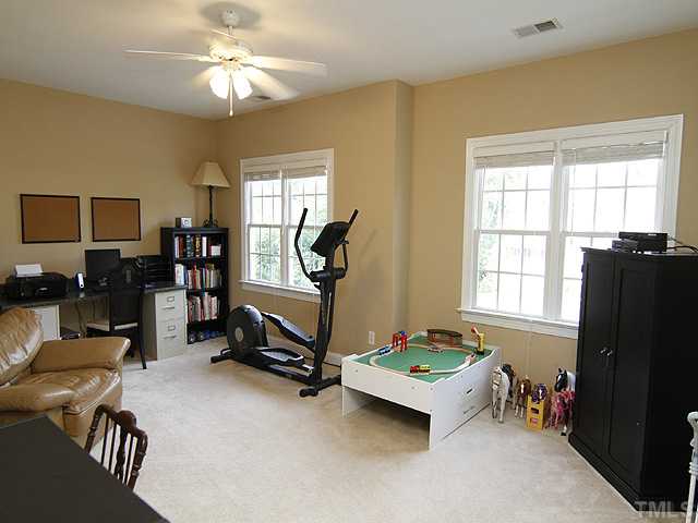 131 Forbes Road Wake Forest, NC 27587 - Photo 10 of 20 Bonus room is currently a multi-purpose room but could be used as a fourth bedroom, an office, a media room, a play room, or a hobby room.