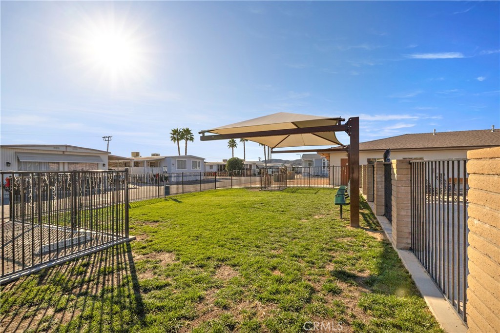 27150 Shadel Road, Unit 122 Menifee, CA 92586 - Photo 25 of 26 a view of a swimming pool with a patio