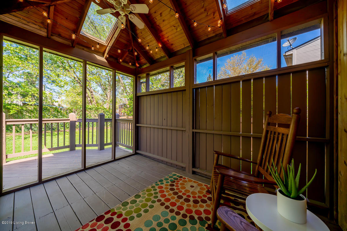 5704 Timber Ridge Drive Prospect, KY 40059 - Photo 37 of 43 Screened porch overlooks fenced back yard.