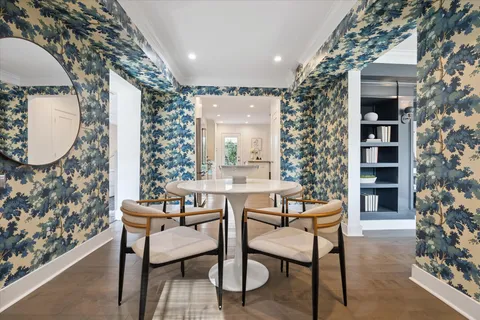 a large kitchen with stainless steel appliances granite countertop a stove a sink and a refrigerator