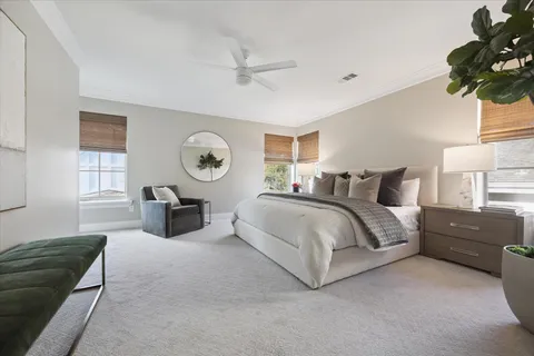 a view of utility room with closet and wooden floor