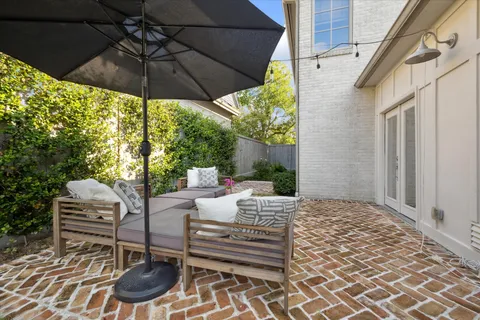 a view of a backyard with potted plants
