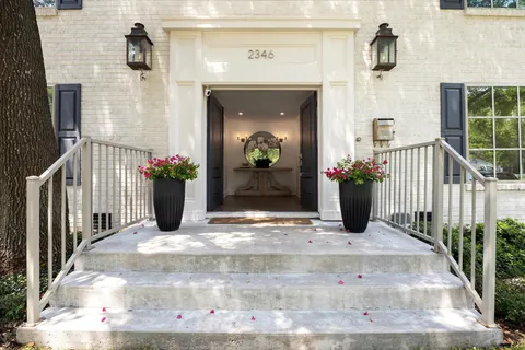 a view of a chairs and tables in patio