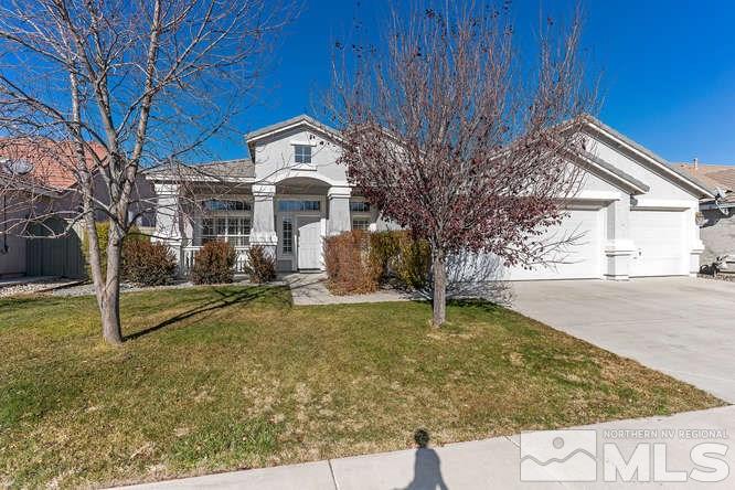1825 Beringer Way Reno, NV 89521 - Photo 1 of 1 a front view of a house with garden