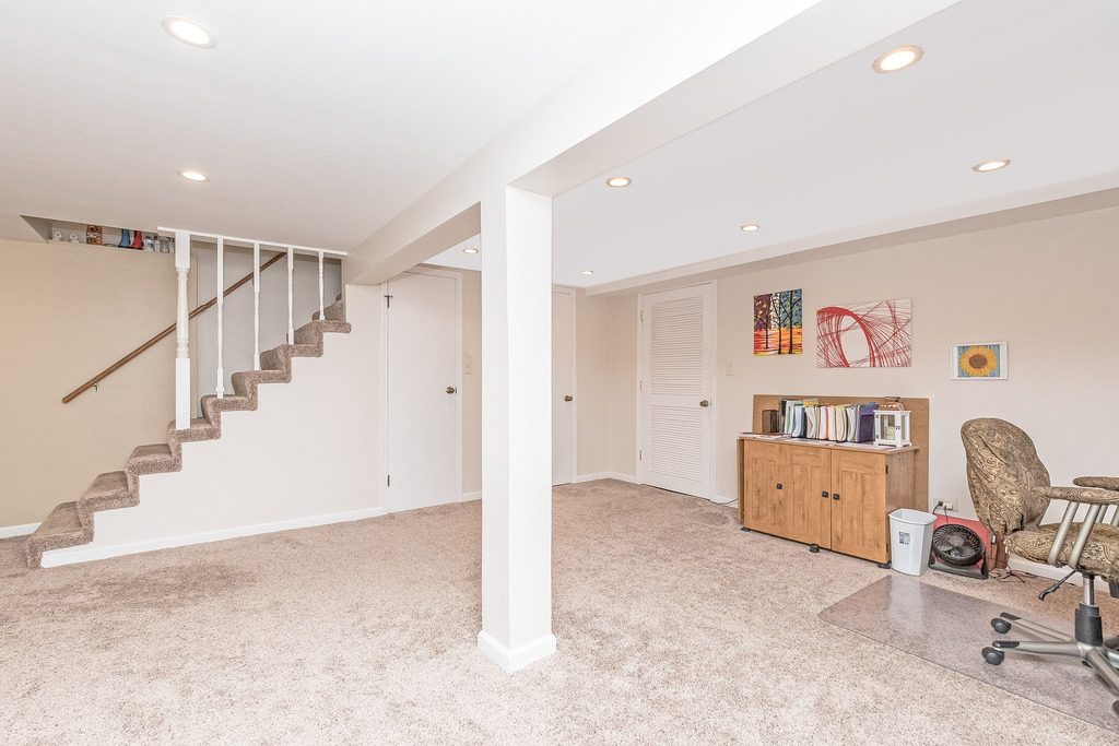 424 Devonshire Court Bolingbrook, IL 60440 - Photo 12 of 16 a view of room with stairs and furniture