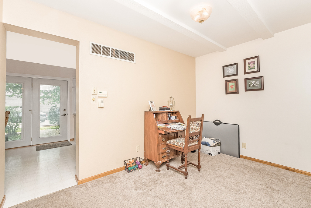 424 Devonshire Court Bolingbrook, IL 60440 - Photo 3 of 16 a view of a workspace with furniture and a window